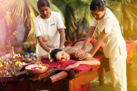 Outdoor Ayurvedic massage with two therapists at Ananda in the Himalayas