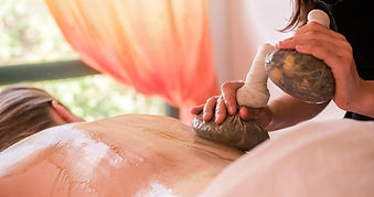 Ayurvedic herbal compress massage at Alpino Atlantico in Madeira