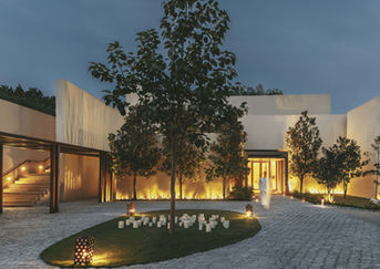 Eco-luxury wellness retreat in forest surroundings, a serene destination for a women's health retreat in India.