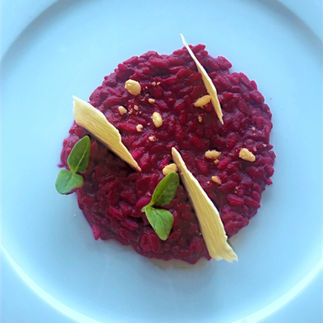 Colourful beetroot risotto from the Chenot Diet at Chenot Palace Weggis, part of the plant-based detox programme.
