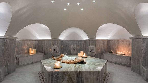 Traditional Byzantine hammam with candlelit ambiance at Euphoria Retreat