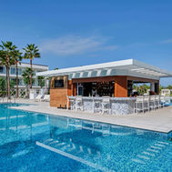 Main swimming pool with pool bar at The View Bouznika wellness resort