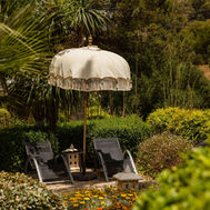 Shaded garden seating area at Shanti-Som Wellbeing Retreat, Marbella