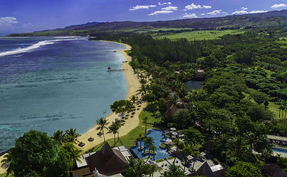 Aerial view of Shanti Maurice Resort & Spa overlooking the lagoon and beach in Mauritius