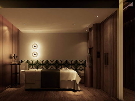 Crystal Ayurveda spa treatment room with warm lighting at Mangosteen Resort Phuket