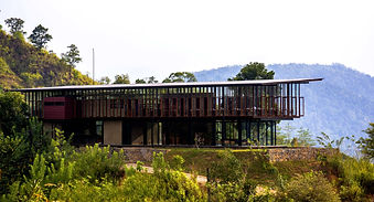 Santani Wellness Resort contemporary glass pavilion set among the Knuckles mountain range