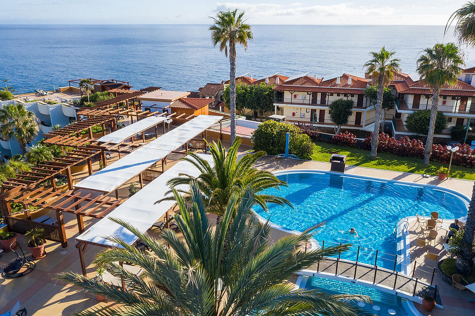 Sentido hotel pool area at Galo Resort Madeira with ocean views