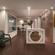 Wellness and spa reception area with comfortable seating and modern design.