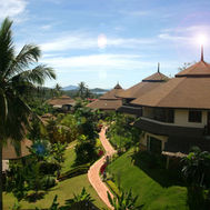 Villas and tropical gardens with pathways at Mangosteen Ayurveda & Wellness Resort