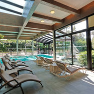 Spa loungers overlooking indoor pool at Park Igls Mayr Clinic Austria