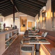 Dining room at Shanti-Som Algarve, with a buffet counter running the length of the room