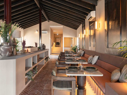 Dining room at Shanti-Som Algarve, with a buffet counter running the length of the room