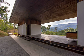 Open-air pavilion at Santani Wellness Resort with minimalist architecture and mountain views in Sri Lanka