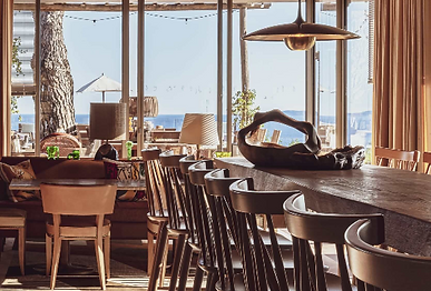 Interior of Lily of the Valley Hotel bar with sea views and stylish decor