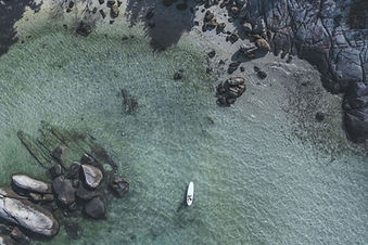 Secluded beach cove below Kamalaya Koh Samui