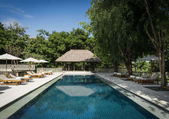 Bali sleep retreat with tropical gardens and pavilions designed for deep rest and renewal.