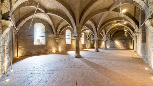 Historic cloister courtyard at Castilla Termal Monasterio de Valbuena with Gothic arches