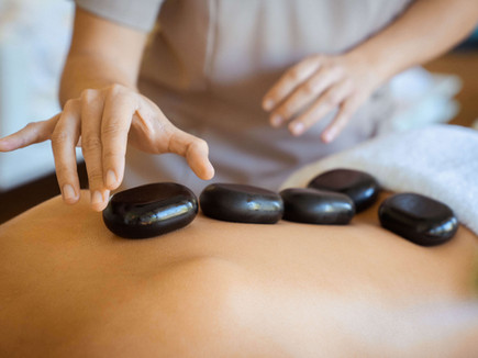 Hot stone massage treatment at Shanti-Som Wellbeing Retreat, Marbella