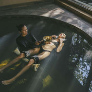 Guest with therapist during a watsu session at Six Senses Vana