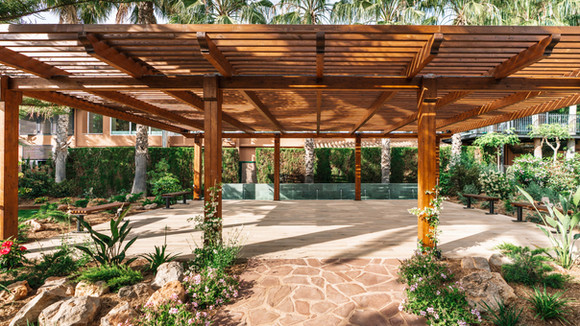 Wooden pergola walkway at Palasiet Thalasso Clinic Spain
