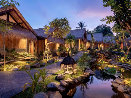 Pathway and villas at Fivelements Retreat Bali surrounded by tropical gardens