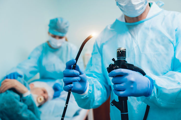 Endoscopy at the hospital. Doctor holding endoscope before gastroscopy. Medical examinatio