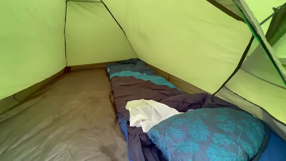 sleeping bag, liner and pillow setup for camping