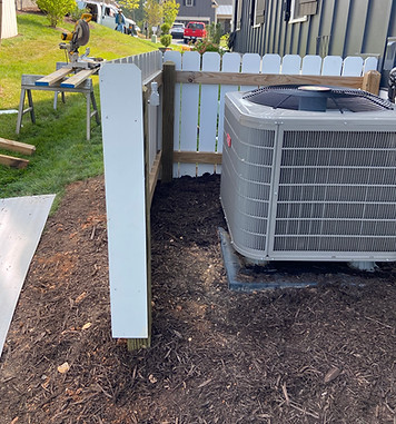 Air conditioning unit fence built for ventilation.