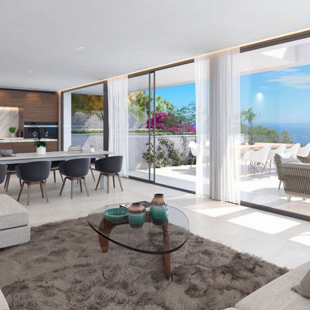 Villa Castaño is the fourth villa within the exclusive gated community of Pinares Hills in Pinares de San Antón, just north of Málaga City Centre. This modern property, part of a prestigious development, boasts a total built area of 566 m², with an interior space of 319 m². Floor-to-ceiling glass throughout the villa allows natural light to flood the open-plan living spaces, offering breathtaking panoramic views. The minimalist kitchen, included in the price, can be customised to your preferences and flows seamlessly into an elegant dining area, perfect for daily use and entertaining.
The villa features 4 stylish bedrooms and 3 contemporary bathrooms, all designed with both aesthetics and comfort in mind. The living room, framed by expansive sliding glass doors, opens onto a spacious terrace that offers stunning views of the surrounding landscape. The outdoor area is equally impressive, featuring a private saltwater infinity pool, expansive south-facing terraces, and beautifully landscaped gardens. Villa Castaño also includes 3 dedicated parking spaces for residents and guests.
Located just 7 minutes from the iconic Malagueta Beach and Málaga City Centre, Villa Castaño offers the ideal balance of tranquility and convenience. Residents enjoy the peace and privacy of a gated community while remaining close to top restaurants, shopping, and cultural attractions. The villa is finished to the highest standards and includes modern amenities such as a wine cellar, an entertainment room, and a private office, making it perfect for luxurious living and hosting guests.
Listed at €2,400,000, Ref HRB-00424P
Villa in Pinares de San Antón, Málaga - Este
4 bedrooms
3 bathrooms
566 m² built
319 m² interior space
247 m² terraces
870 m² plot
Private Pool
Private Garden
Private Garage with 3 parking spaces
Completion in 2025.