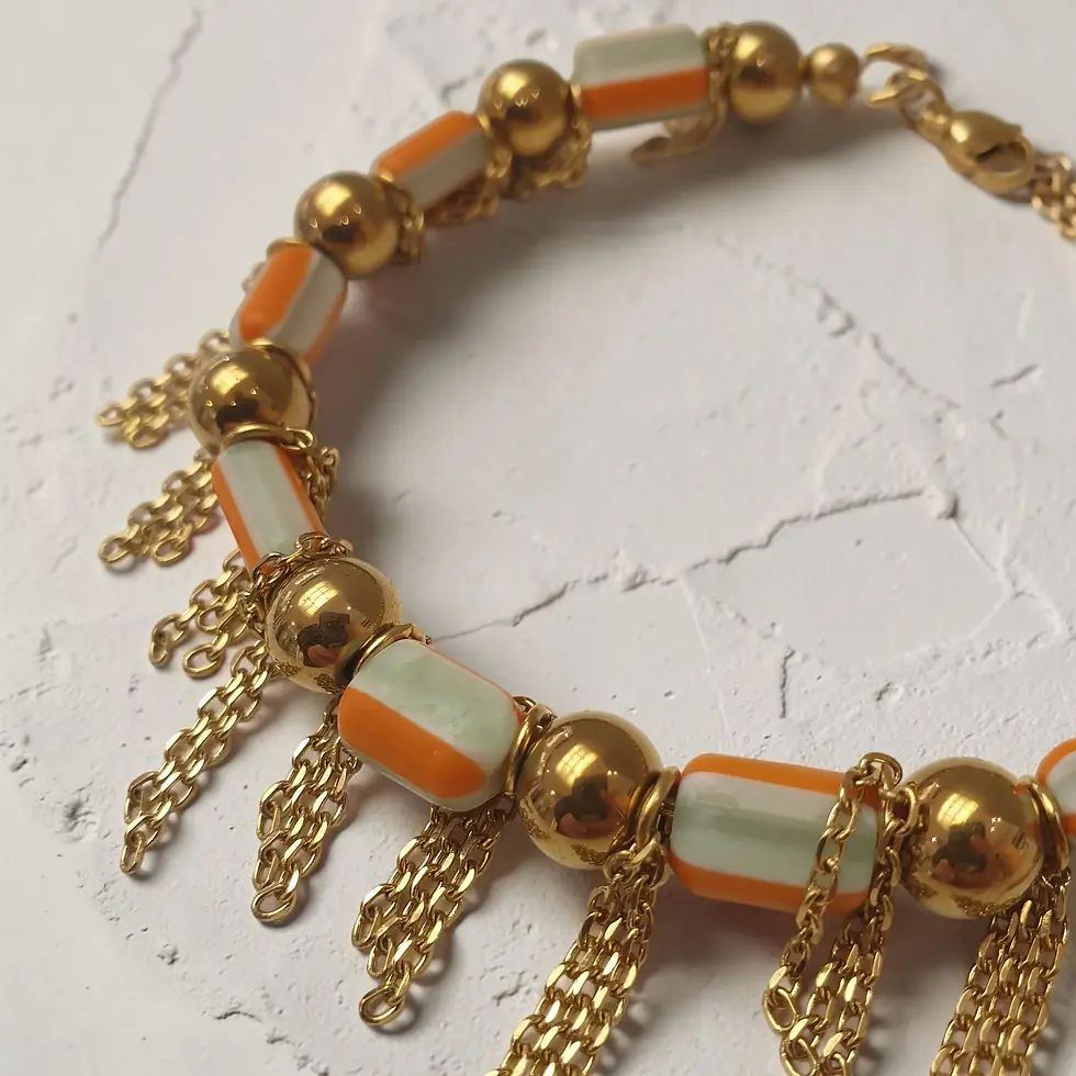 Bracelet Adrien, chaînes dorées et perles graphiques 1