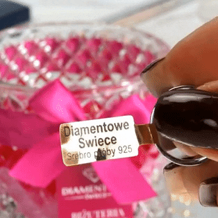 Jewelry tag from a sachet embedded in a candle