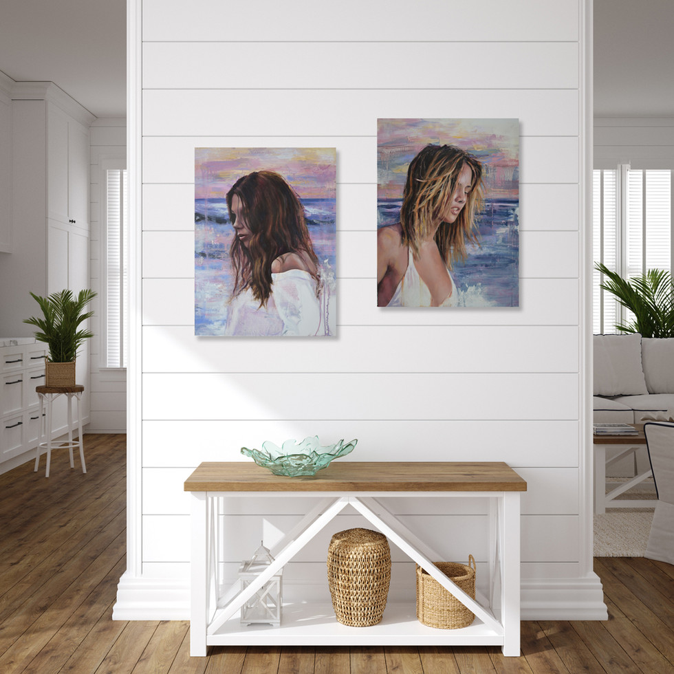 painting of woman at beach, hanging with it's matching artwork in home interior