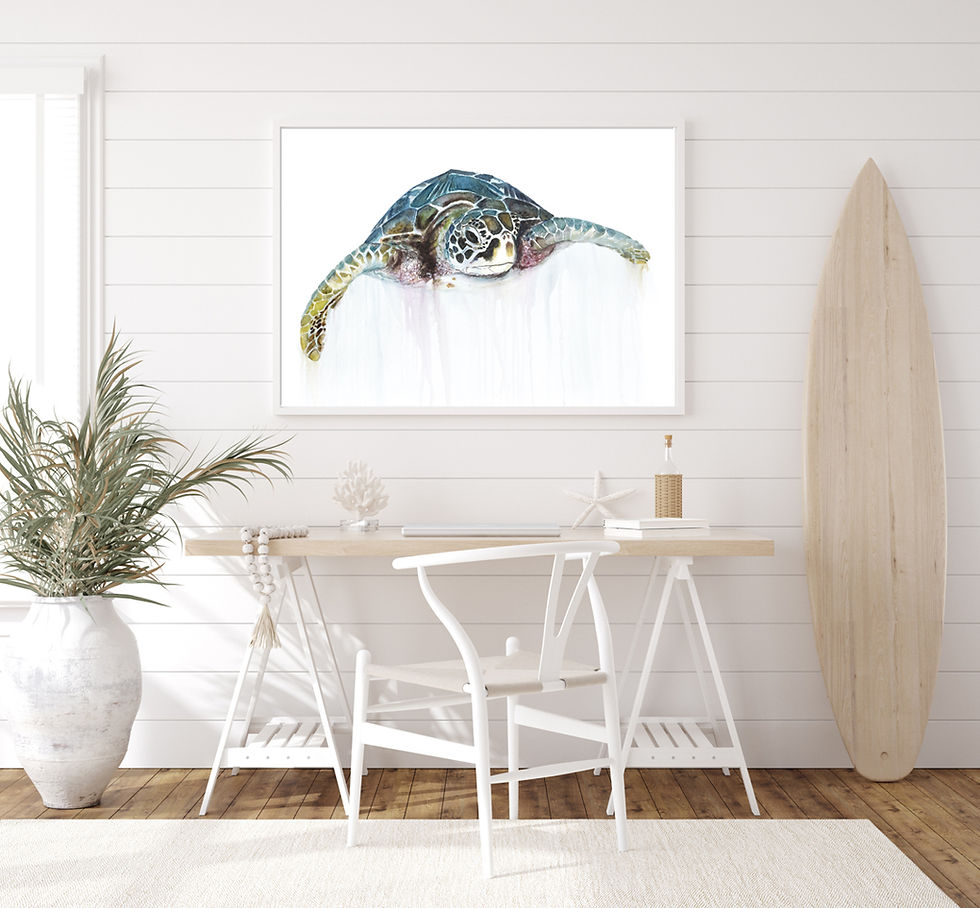 print of a sea turtle, framed and displayed in a beach home