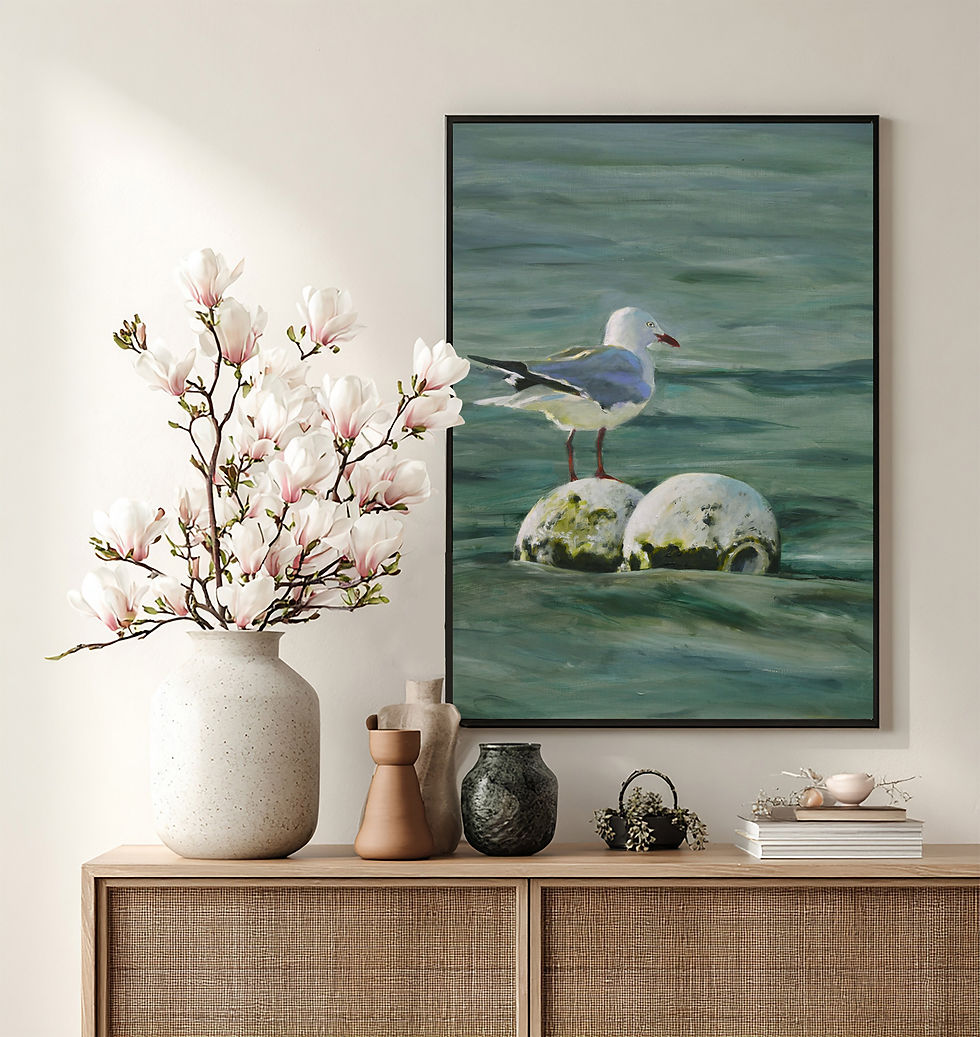 Drifting Gaze' seagull ocean art print styled in a modern floating wooden frame above a console table.