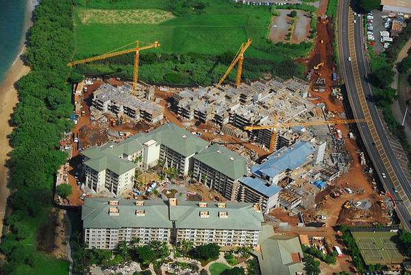 An overhead view from a helicopter of the West Ka'anapali resort under construction. E3's cogen system is in the bottom right near the tennis courts.
