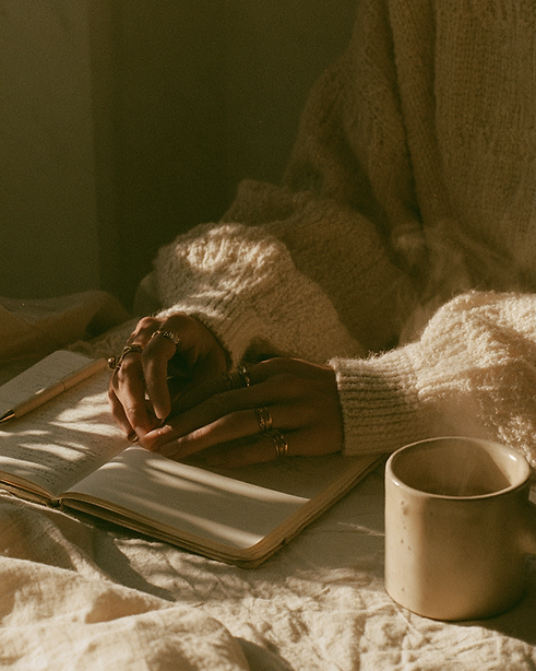 hands with journal