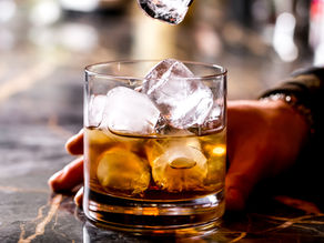 glass with gourmet ice cubes in it