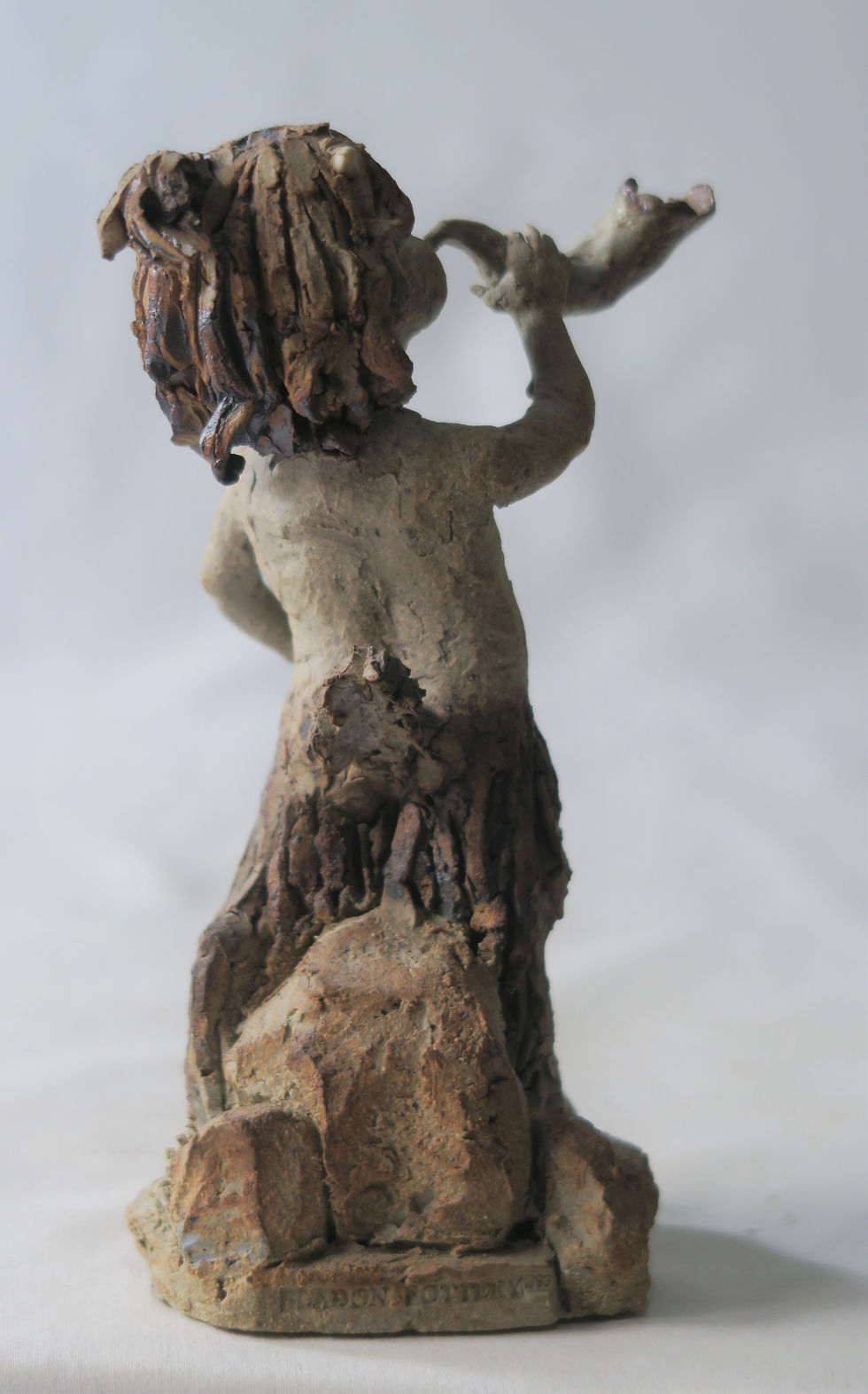 Thumbnail: Faun Blowing Horn