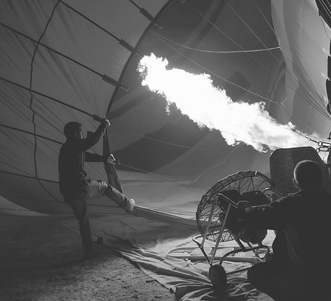 person-preparing-hot-air-balloon-2563596