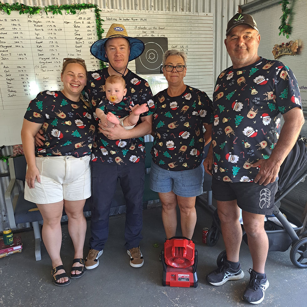 The family who shoots together wear Christmas shirts together! Looking good guys