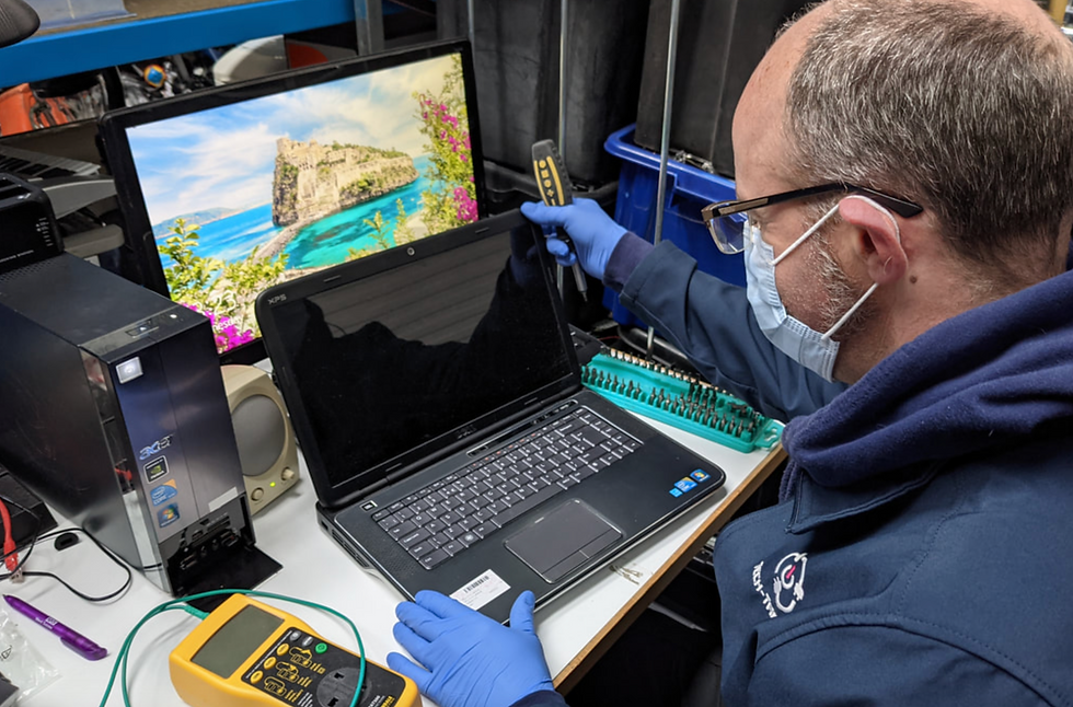 Image of laptop refurbishment in TTB's warehouse.