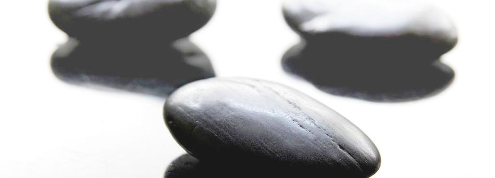 stones used in hot stone massage are typically basalt, volcanic rock that is usually high in iron, which allows them to absorb heat.