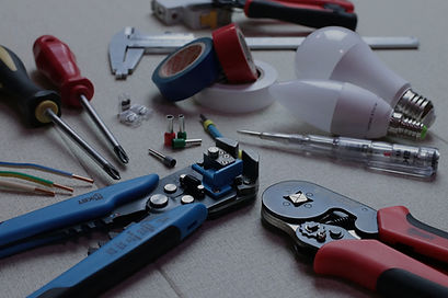 Tools used in electrician fixing or troubleshooting a house wiring issue
