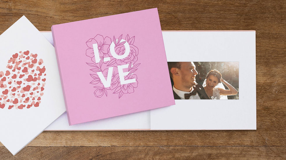 Anniversary video book with built-in screen displaying a wedding video.