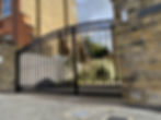 Wrought Iron driveway gate curved top