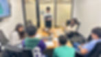 Teens practicing public speaking and presenting their business ideas in entrepreneurship classes for teens.
