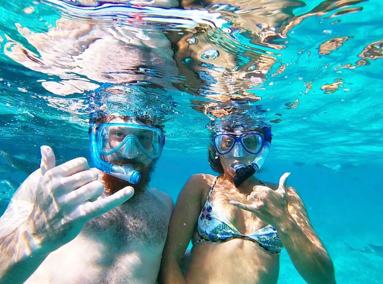 Group snorkeling in Belize clear water