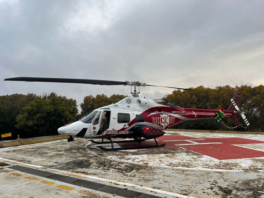 ROCKET Bell 222 air ambulance landed on a hospital helicopter landing pad