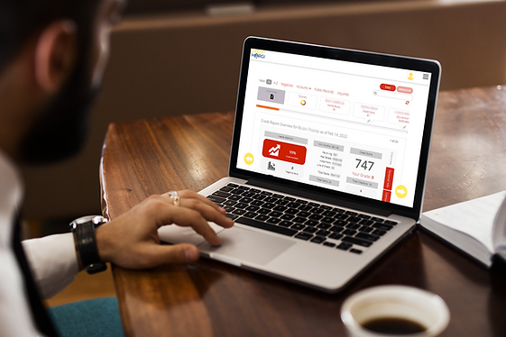 mockup-featuring-a-man-using-his-macbook-pro-on-a-wooden-desk-2321-el1.png