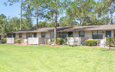 Front view of Pinellas Pines with stylish design and inviting curb appeal.